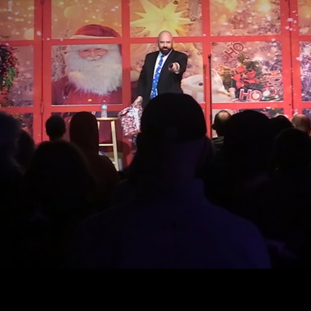 Tim Palmer performing at a holiday show